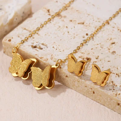 Conjunto de joyería de collar de pendientes de acero inoxidable con diseño de mariposa doble para mujer